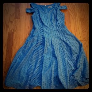Blue long dress. Cut out sleeves.